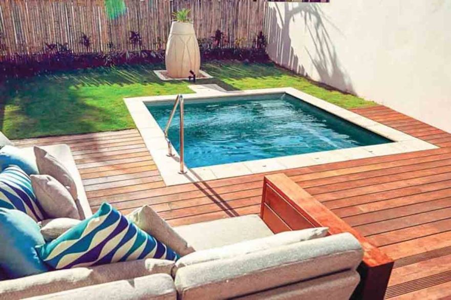 small plunge swimming pool in tiny yard