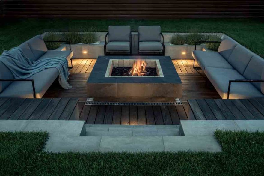 outdoor private fire pit for family at night