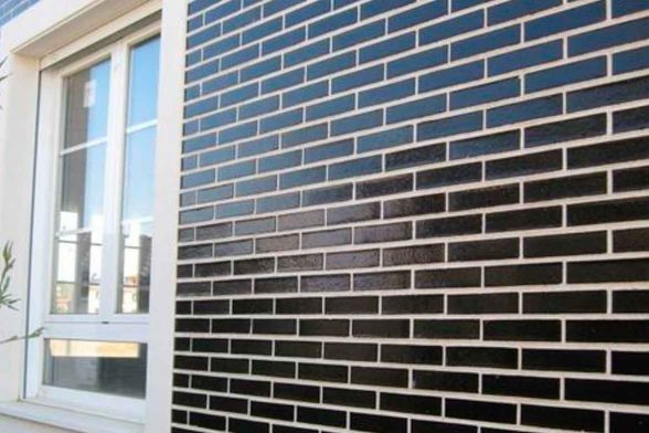 charcoal brick dark black brick white trim contemporary house stylish 