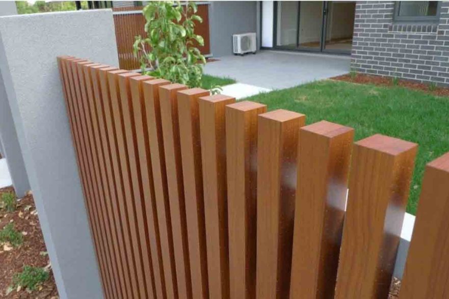 batten timber fence natural look with wood pillars front yard