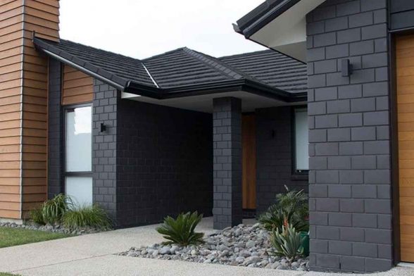 charcoal brick house dark black brick grey trim dark trim motar