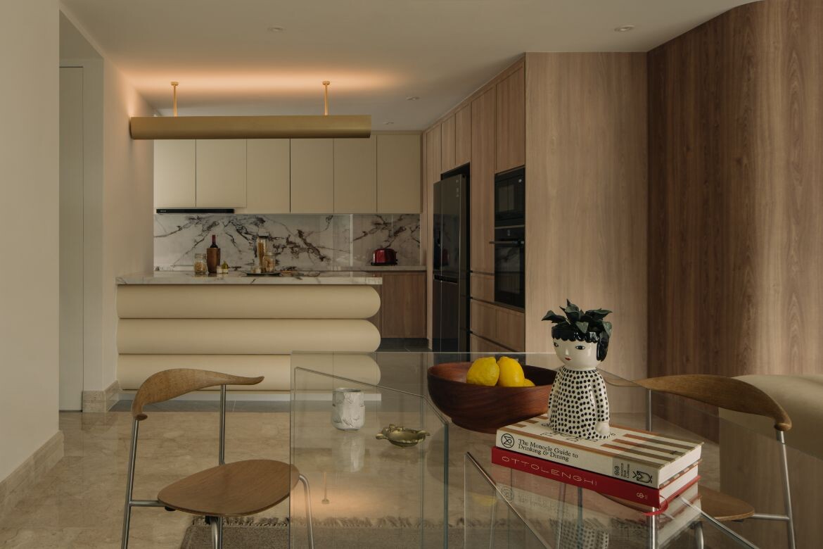 A statement kitchen island is the centrepiece of this apartment