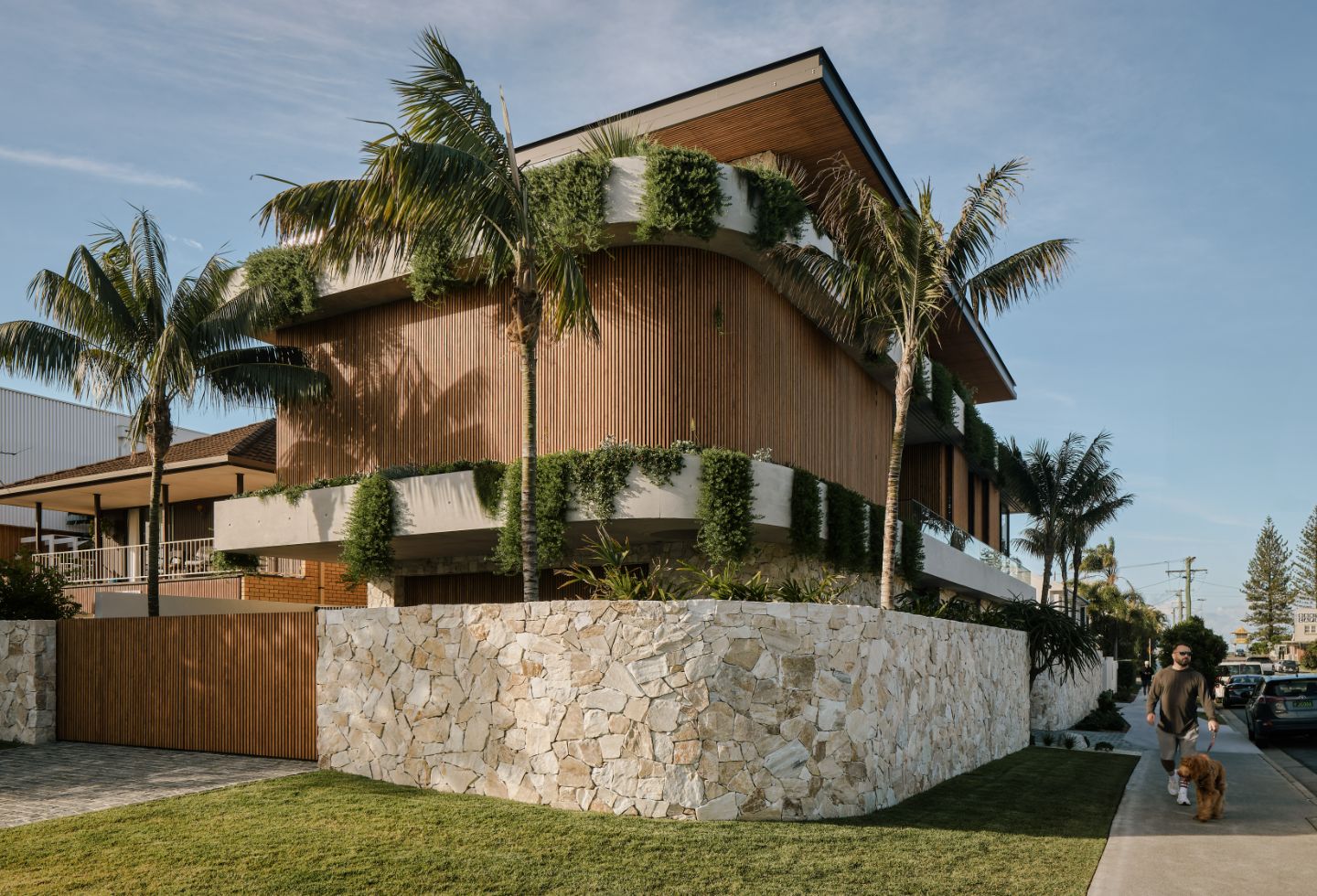 Hard-lined architecture, softened by greenery