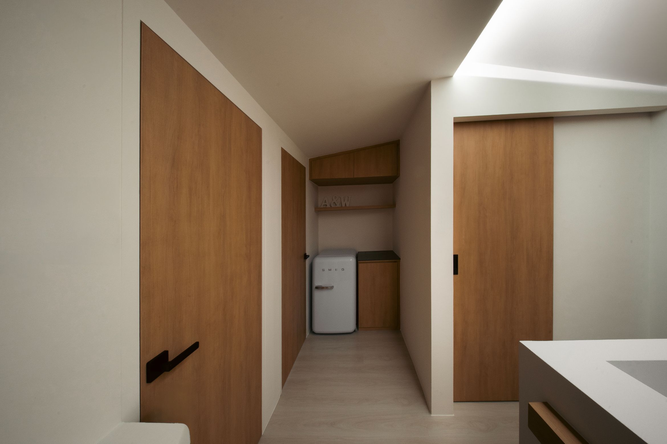 Studio Kabi shapes a family home within a Bishan maisonette