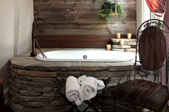 stone bathtub natural raw log cabin rustic bathroom