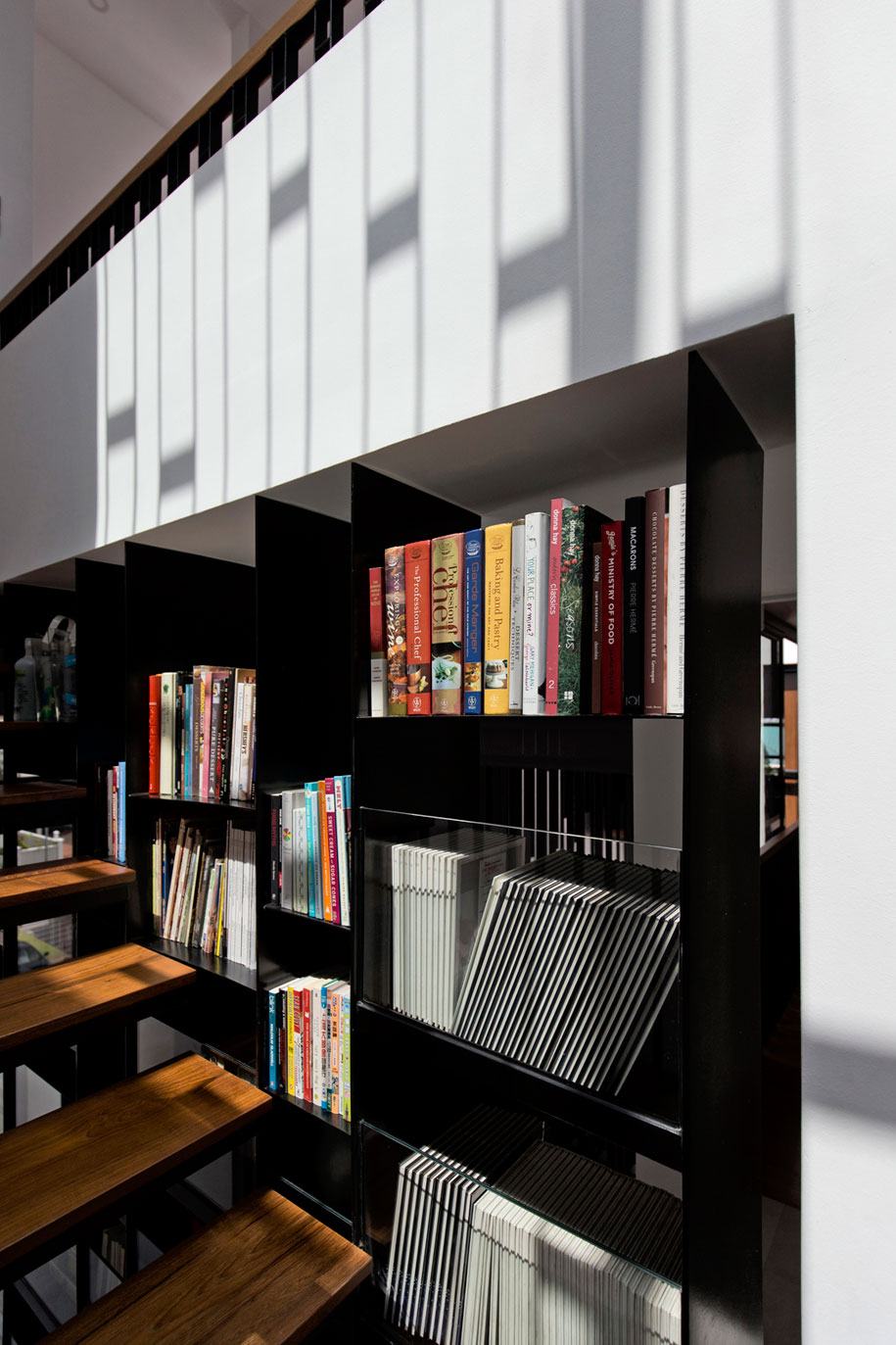 4-main-stairs-winding-round-steel-bookshelves-2