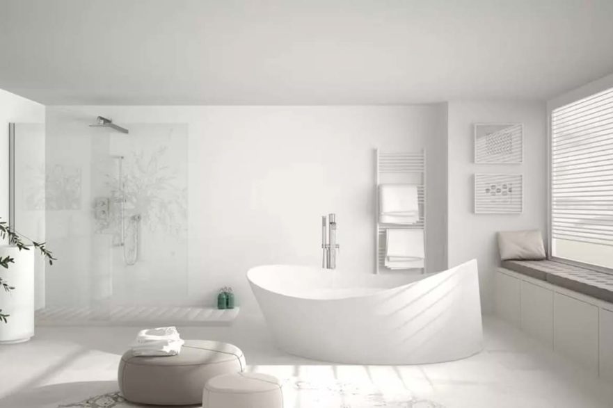 large bathroom with huge bathtub white tile