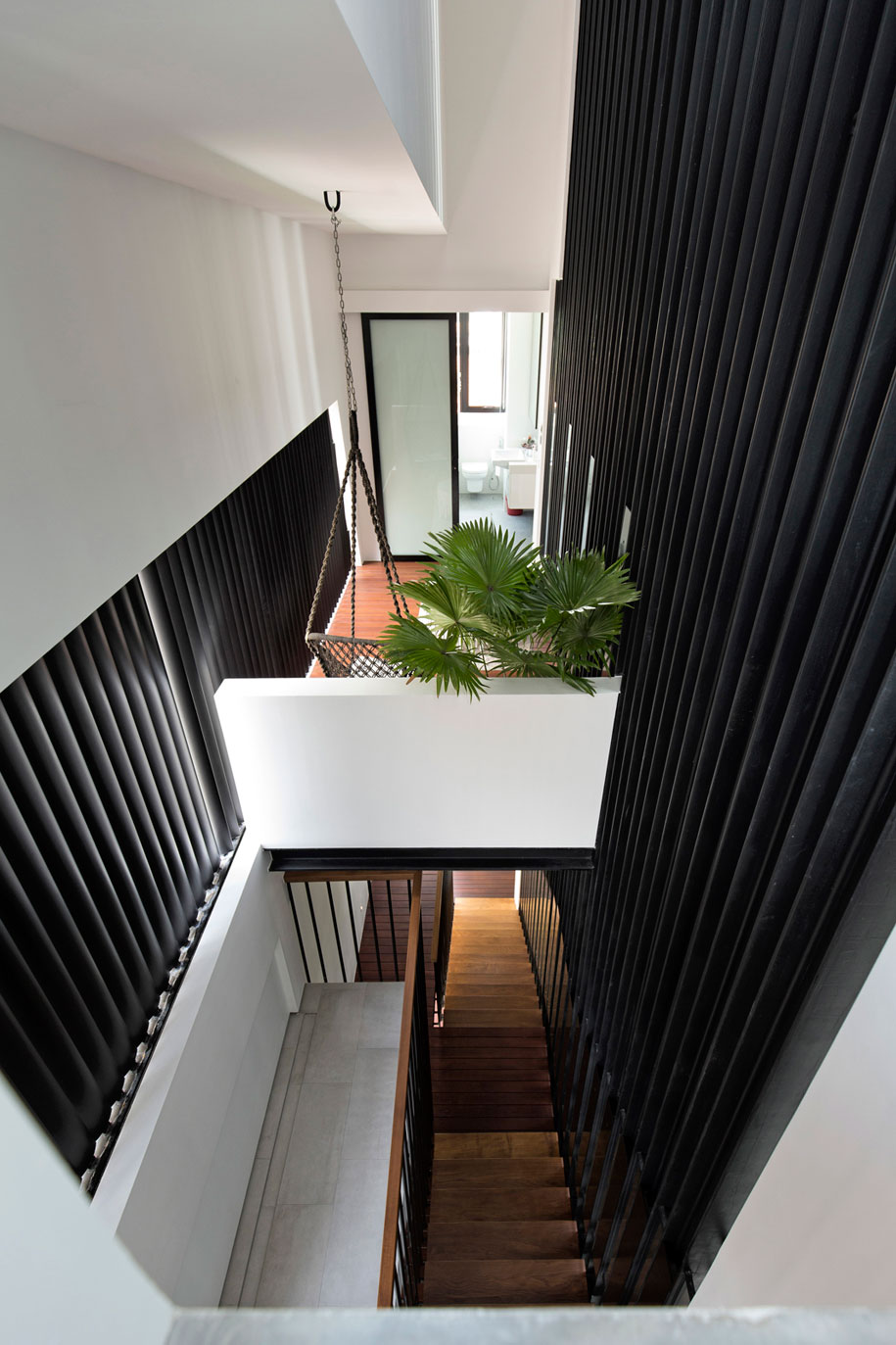 5-view-from-3rd-sty-towards-bedroom-2-side-balcony-and-stairs