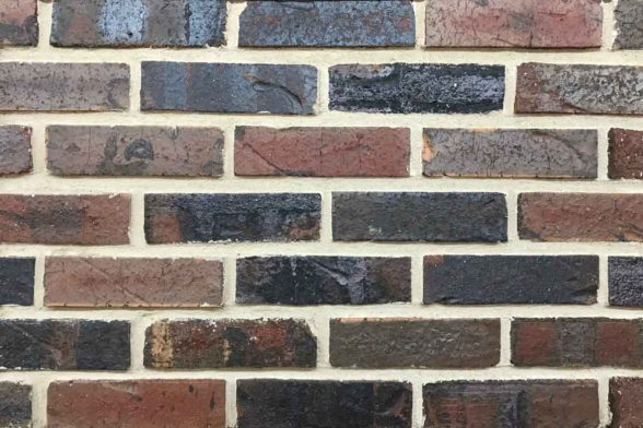 clinker brick wall close up irregular fired scorched brick
