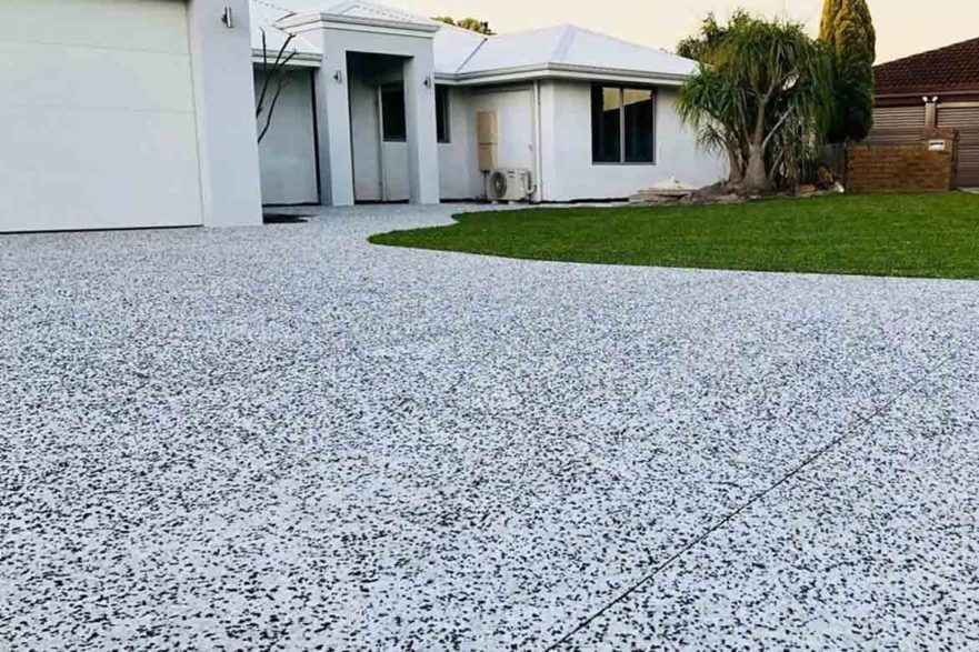 white concrete driveway exposed aggregate rough washed cement