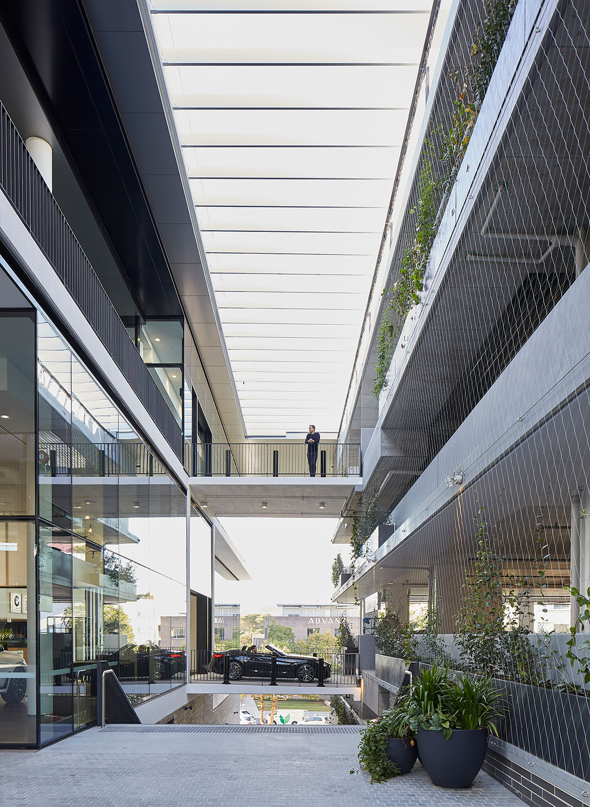 BMW MINI Car Showroom by SJB CC Marin Mischkulnig stair entrance