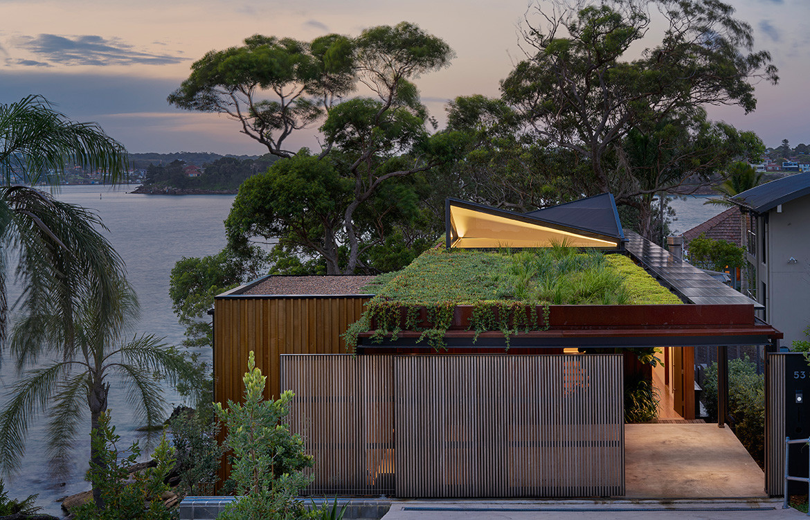 The passive solar design of Bundeena Beach House by Grove Architects is enhanced by the rooftop garden, which reduces heat absorption, increases insulation and collects rainwater for irrigation.