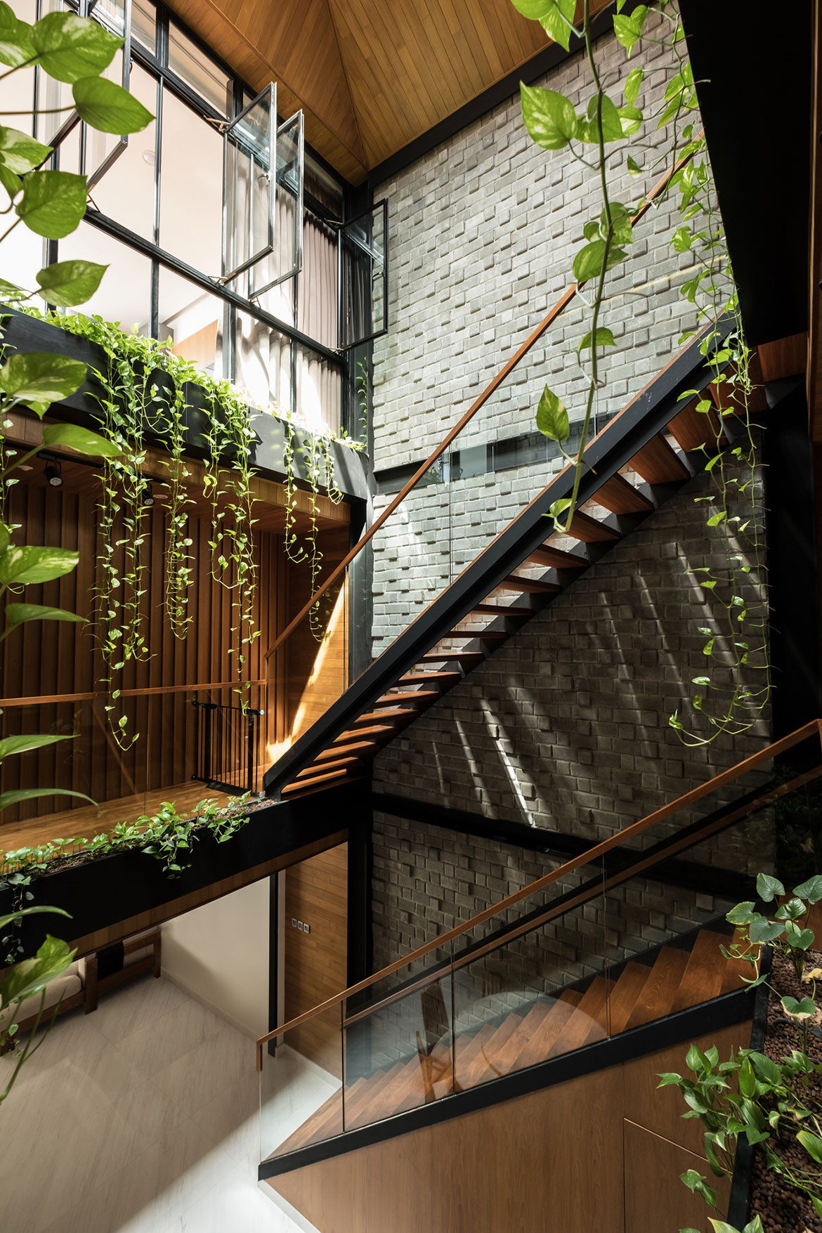 Produce Singapore family home stairs and courtyard