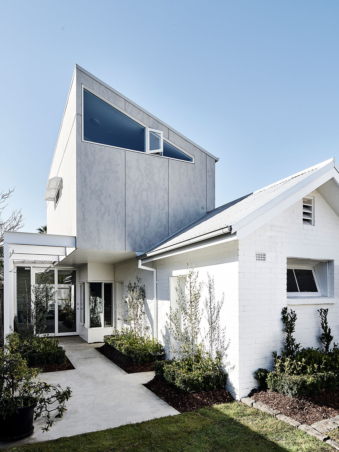 Dan Gayfer integrates a 125-year-old former dairy at the rear of his clients' Footscray property into their home’s new extension.