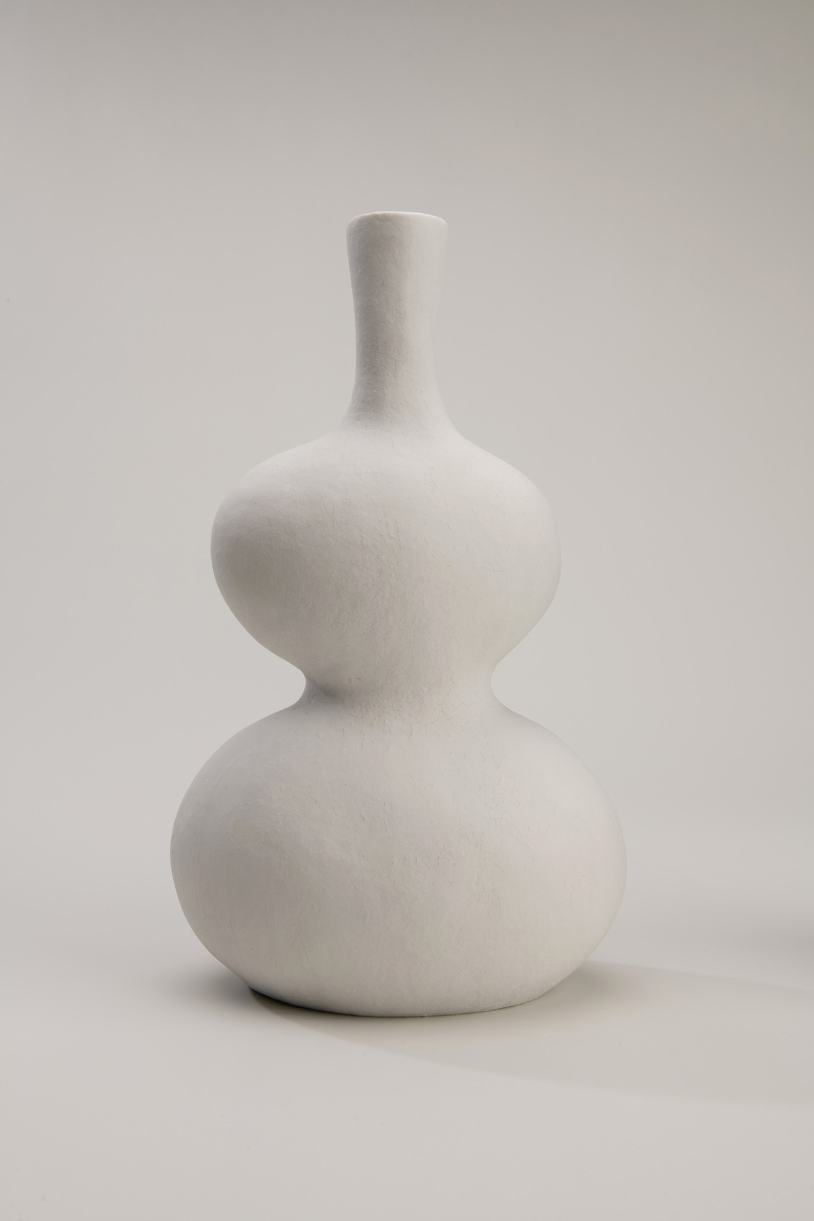 Eloise White's white ceramic vessel on a white background.