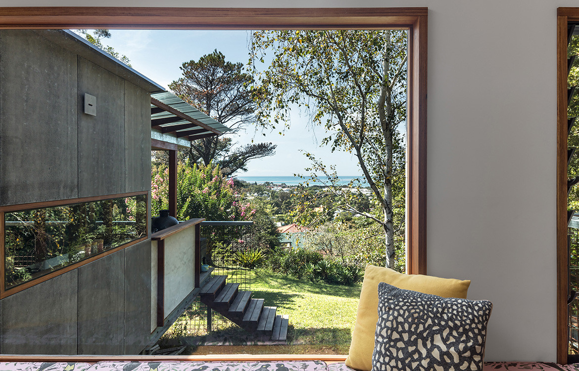 Studio Takt added a north facing living pavilion to a dark, cramped 1950s brick bungalow in Illawarra, NSW, to open Exoskeleton House up to the northerly aspect and connect it to its landscape.