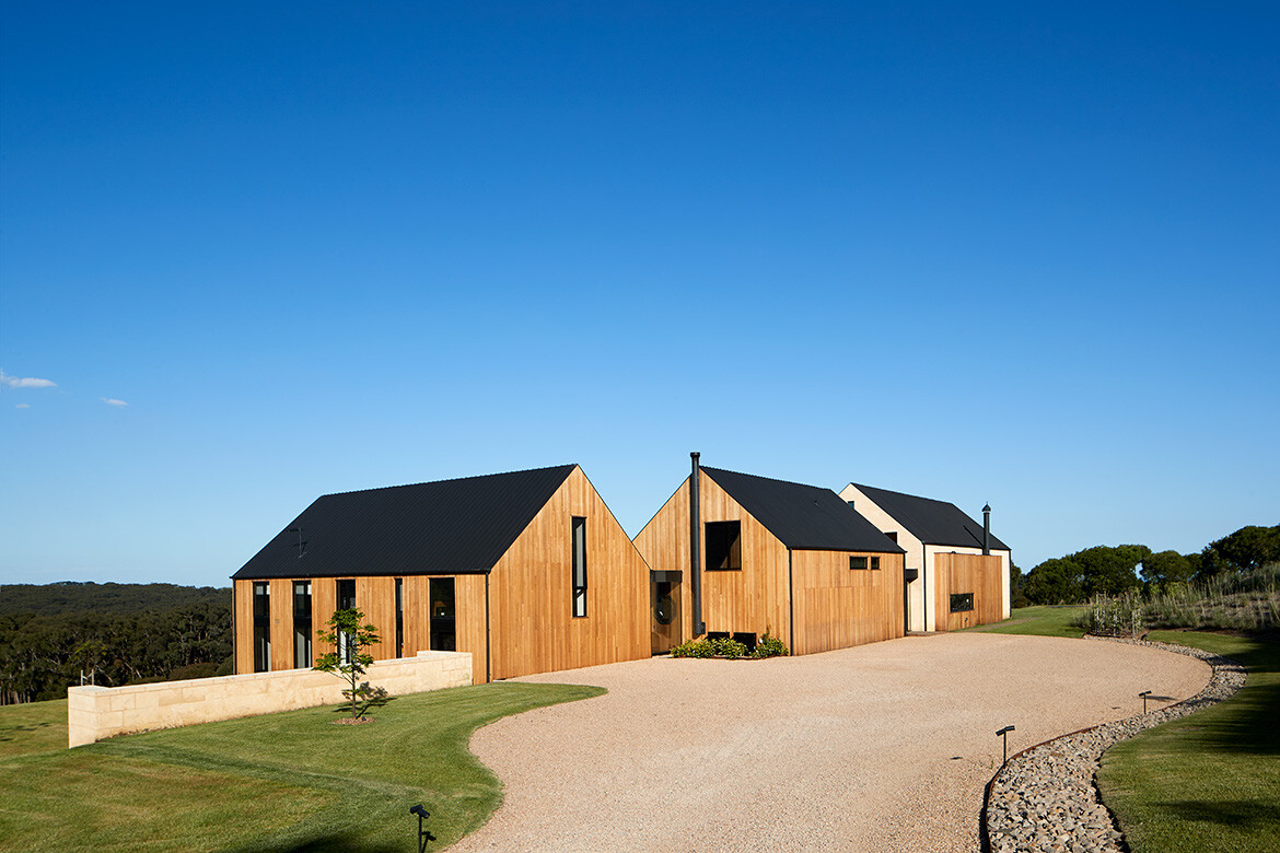 A series of crafted sheds make for a down to earth family home