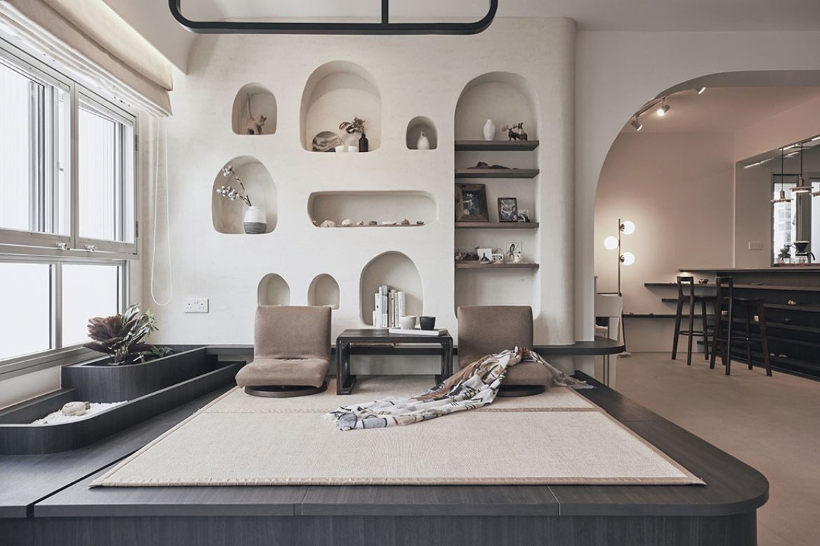 An apartment with neutral tones and organic forms