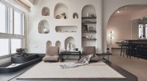 An apartment with neutral tones and organic forms