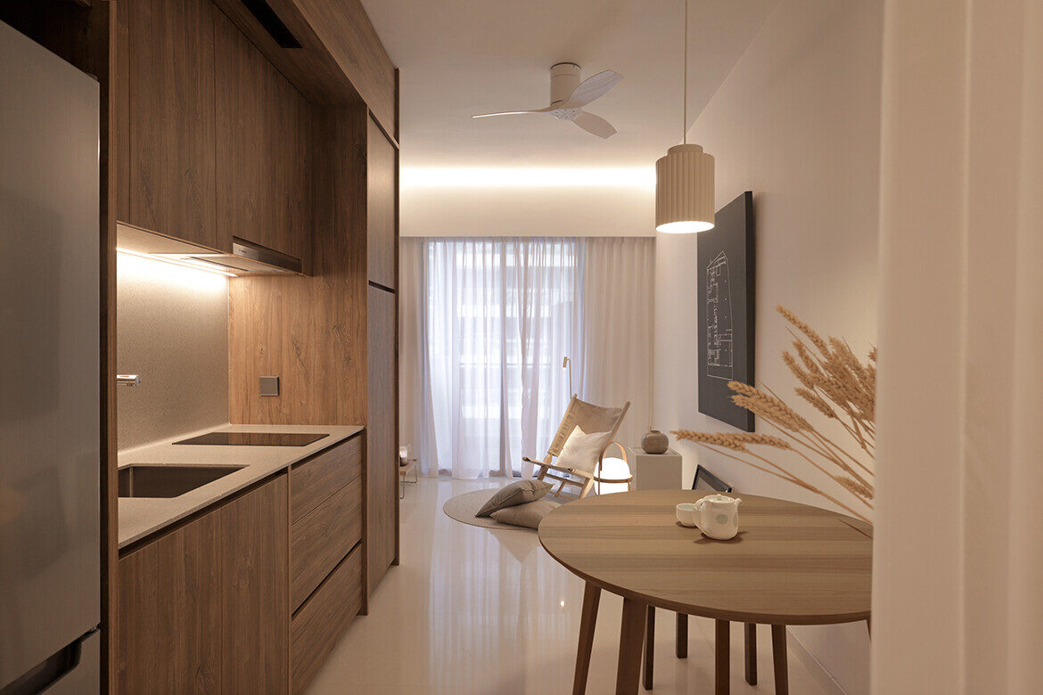Life unfolds around a central box in this tiny apartment