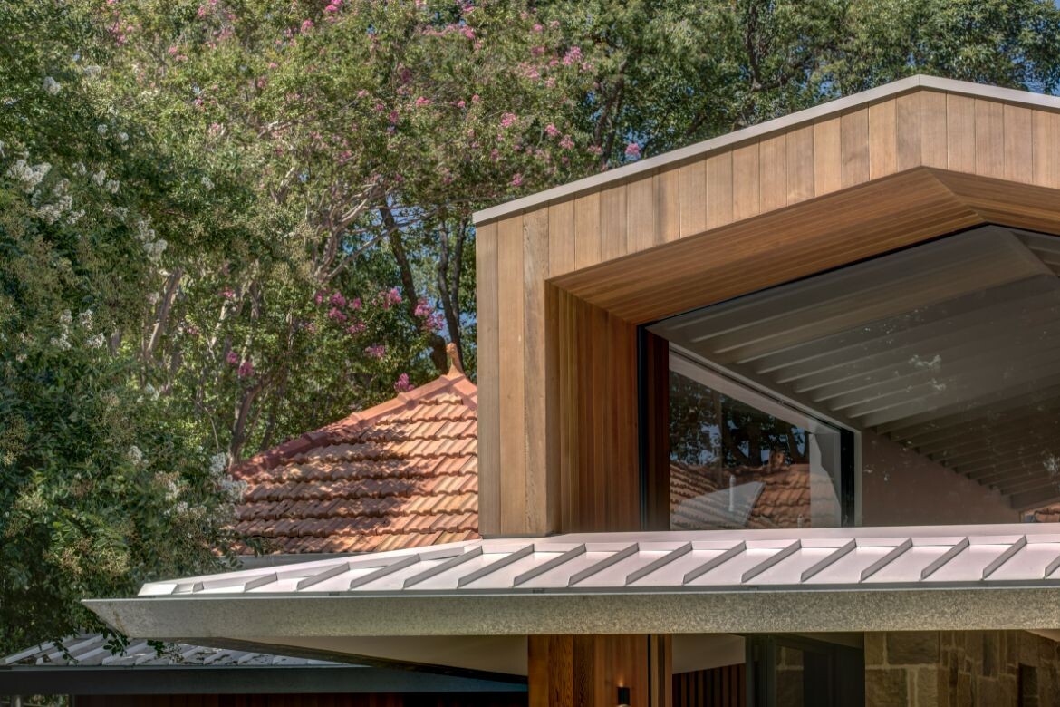 A gable roof form on the addition at Hunters Hill House echoes the original sandstone cottage