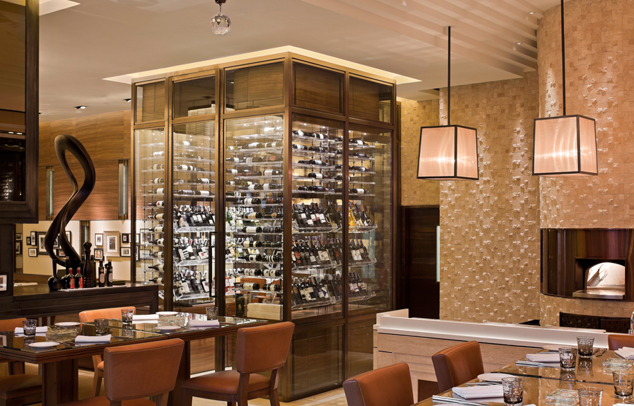 Jojo-St-Regis-18-dining-area-with-wine-room-and-pizza-oven