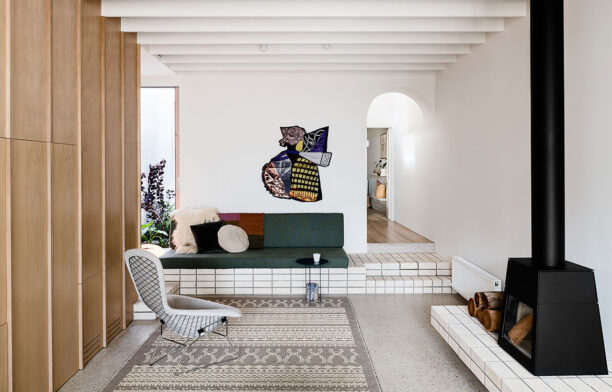 The interior design of Storybook House by Folk Architects, a Victorian terrace extension, features timber wall panelling, terrazzo flooring and built-in furniture finished with subway tiles.