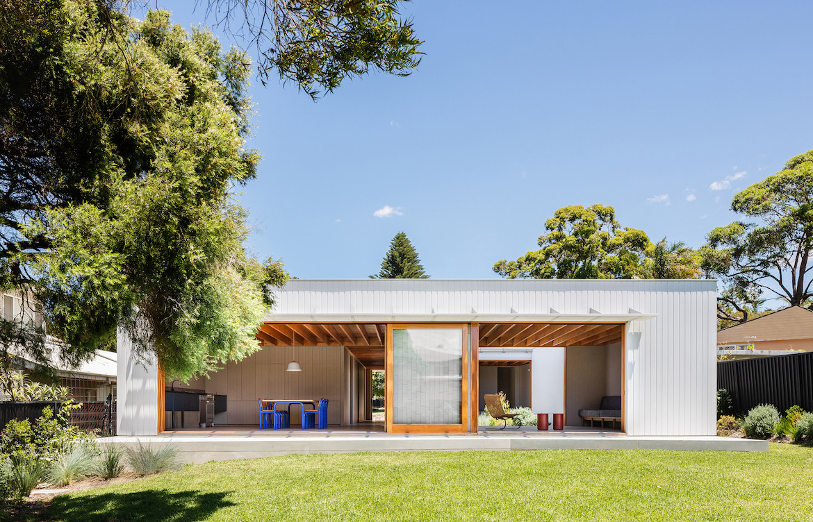 The white wooden exterior of Tribe Studio Architect's Bundeena Kit-Home.