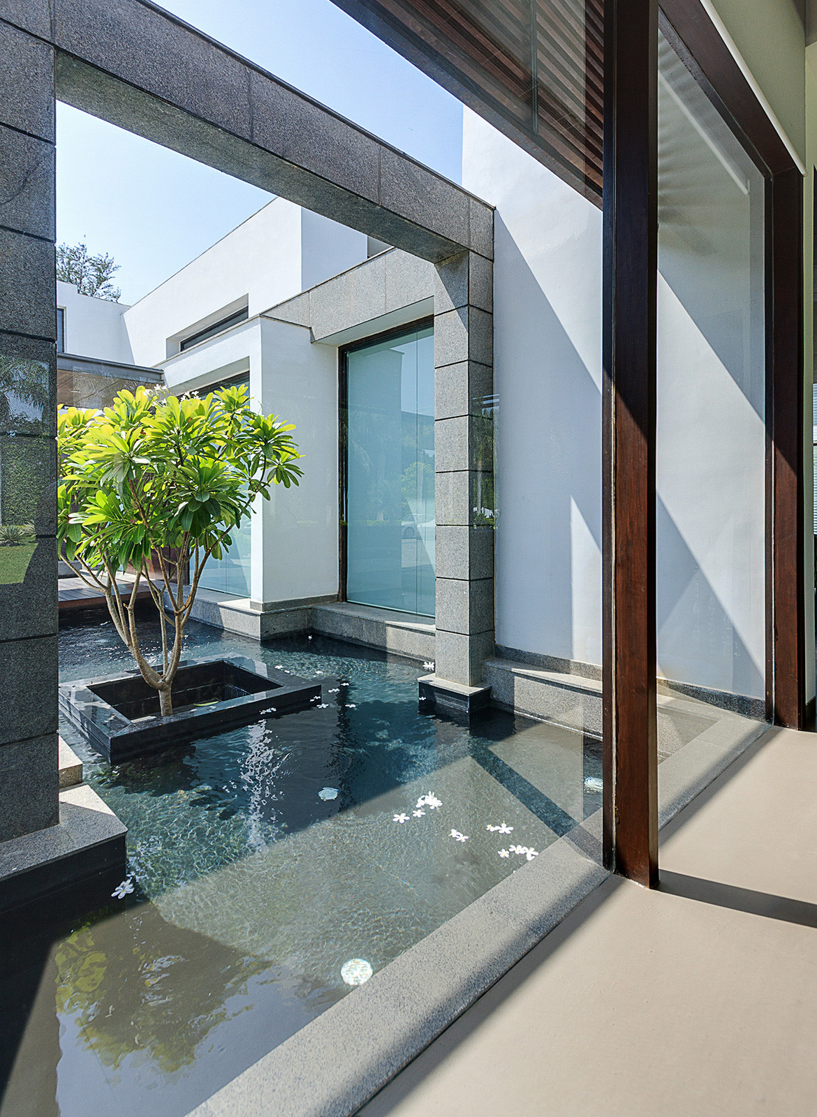 The Centre Court Villa Pomegranate Design framed courtyard window interior exterior