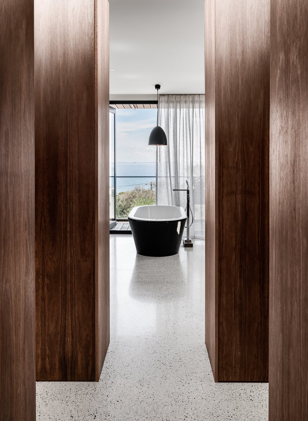 Two Angle House Megowan Architectural CC Tom Blachford framed bathroom corridor