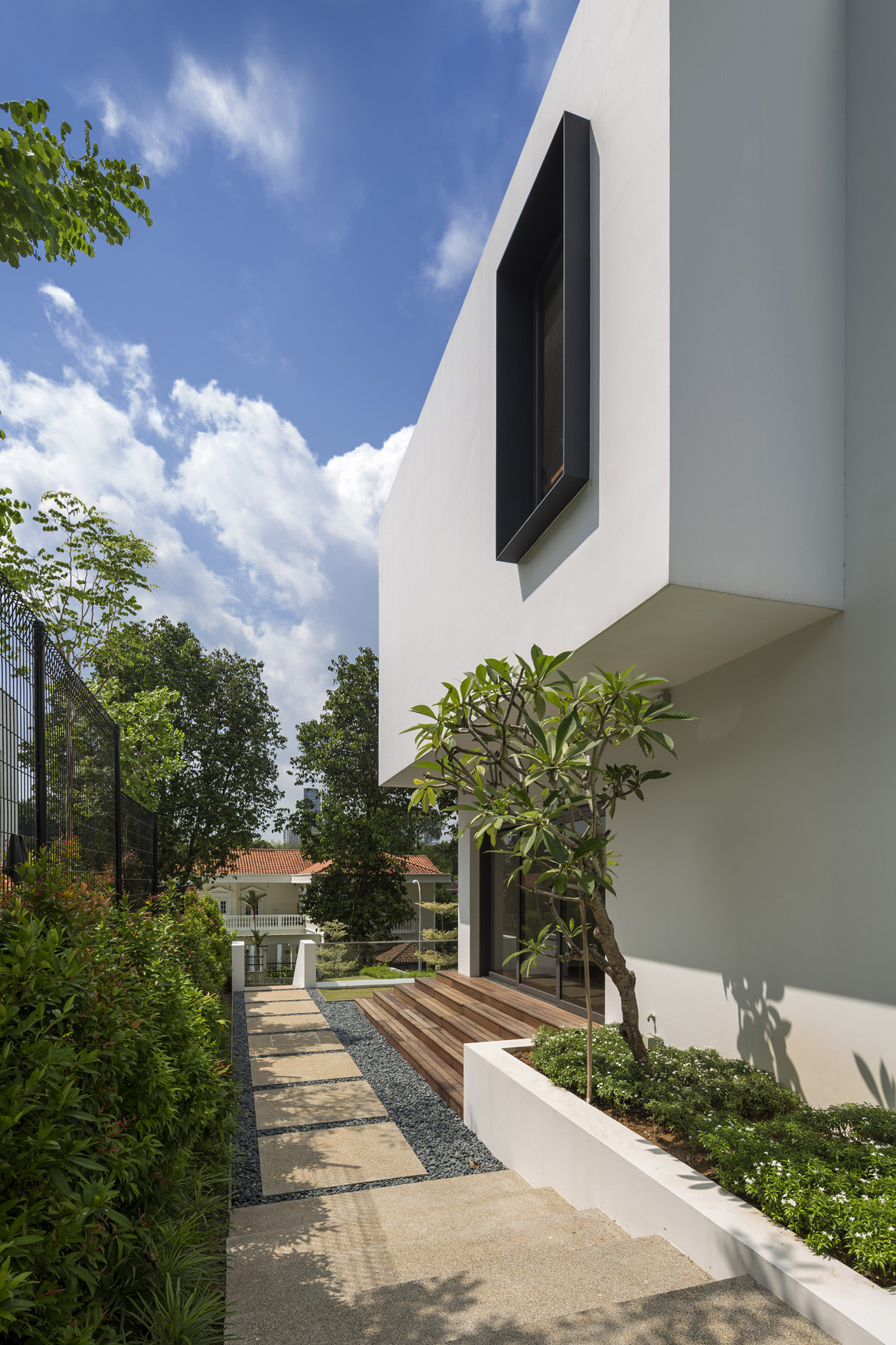 See Through House Photography by Marc Tey Side entrance